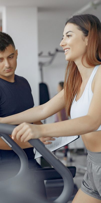 Young sports people training in a morning gym