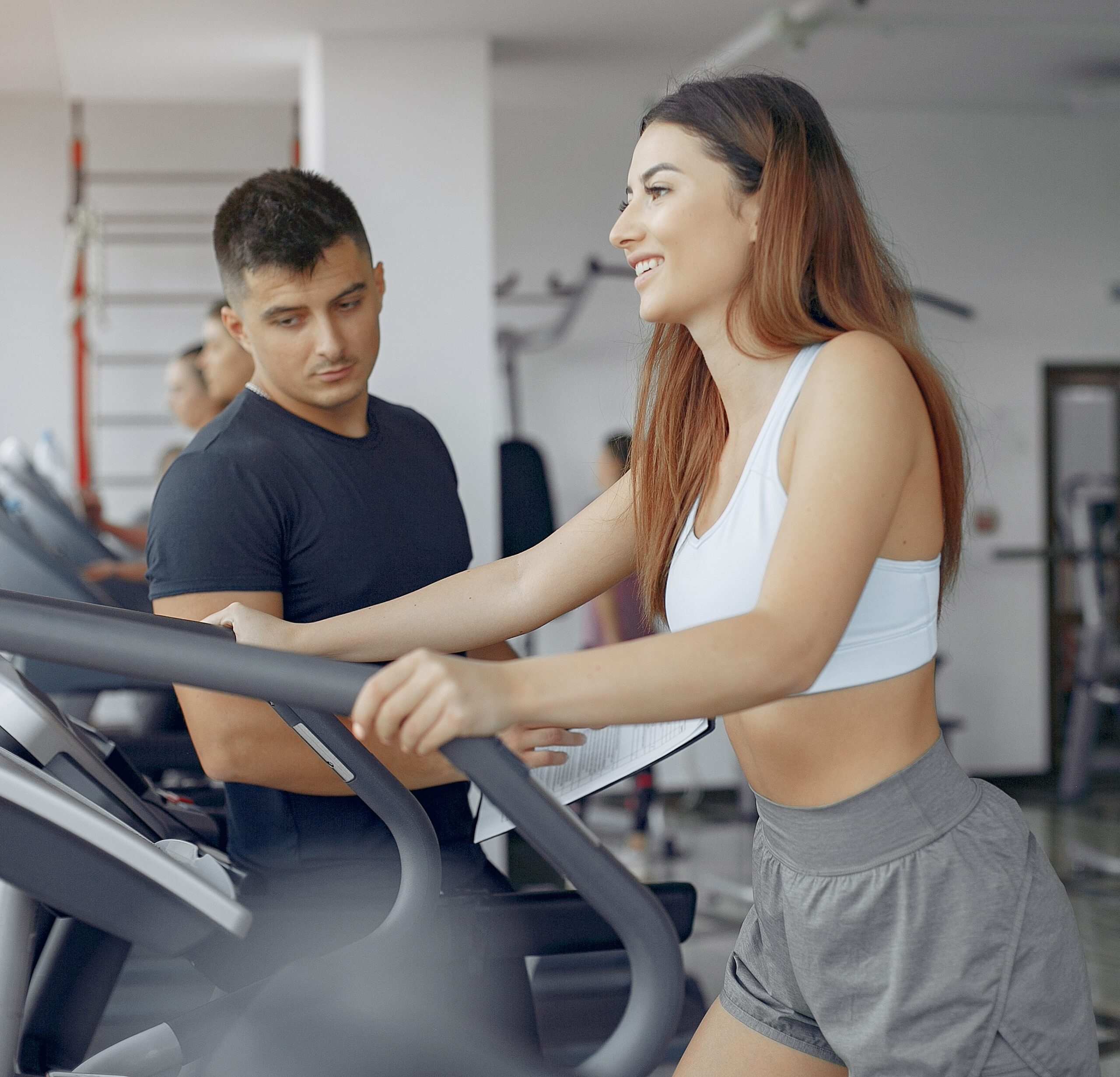 Young sports people training in a morning gym